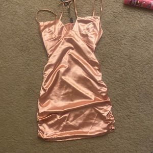 Pink Satin dress. Never been worn.